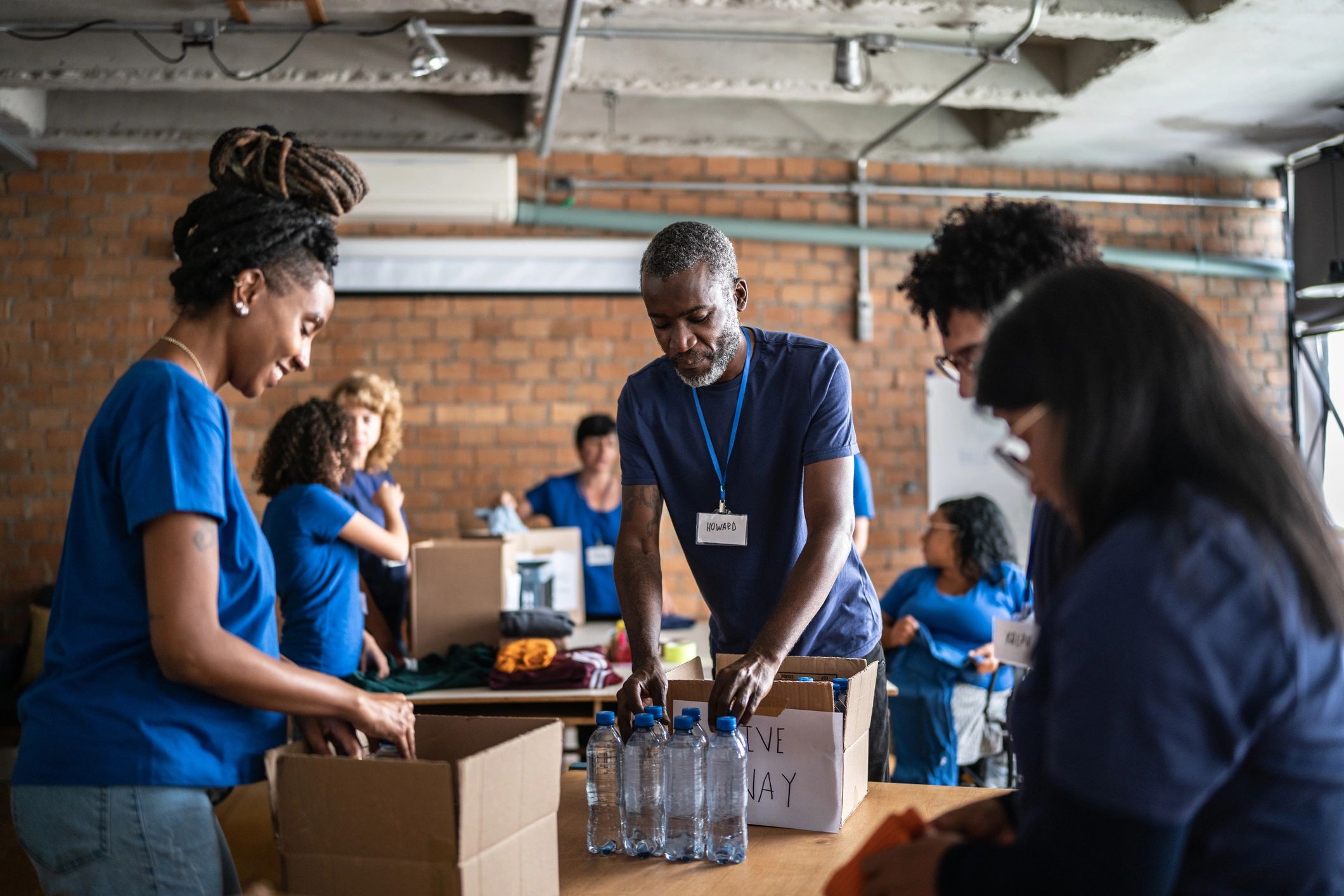Volunteers organizing donations for community outreach