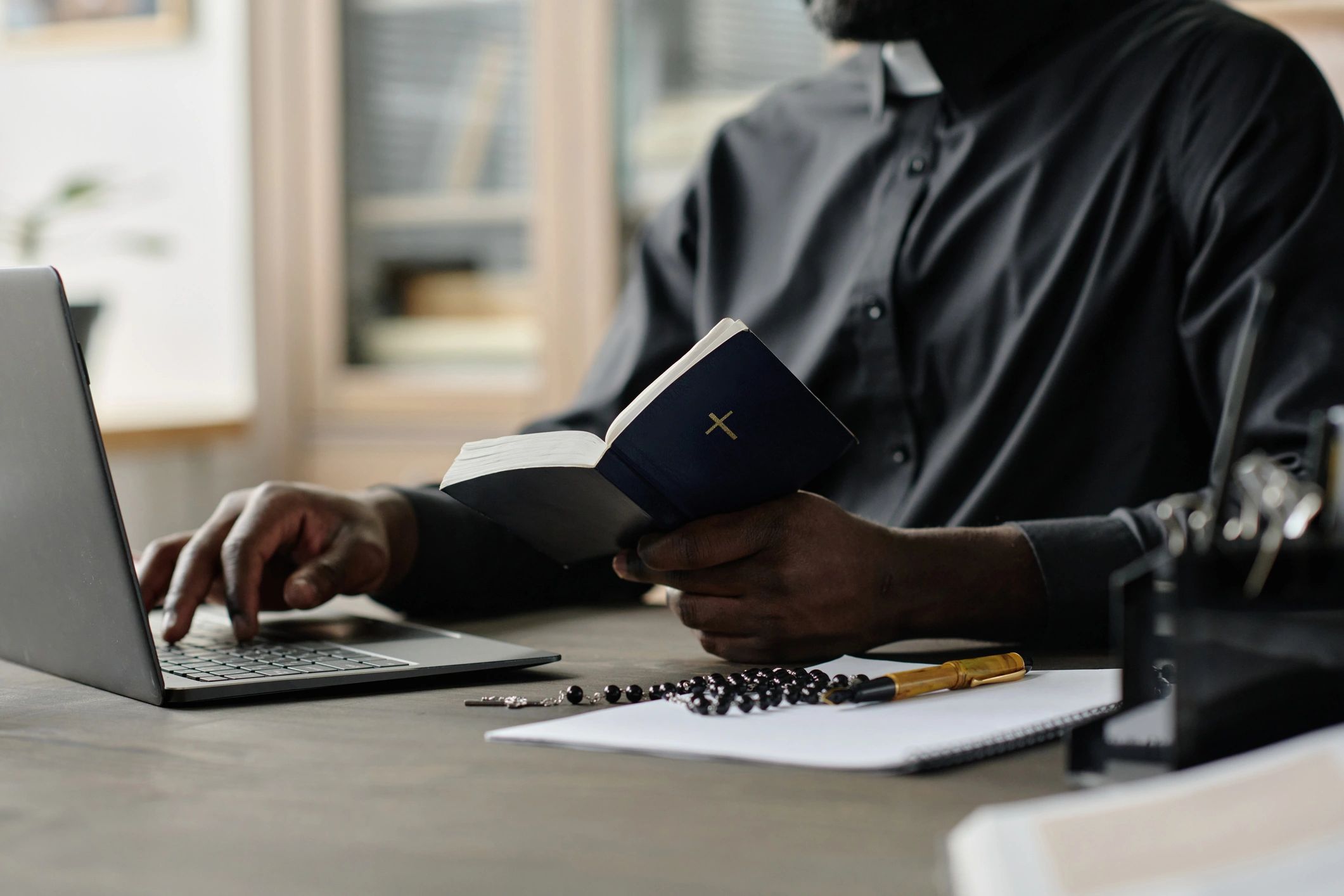 Pastor preparing a sermon in a church office